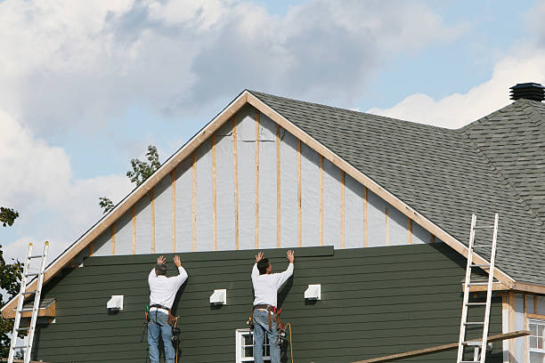 Professional Storm Damage Siding Repair technician working in Hagerstown, IN